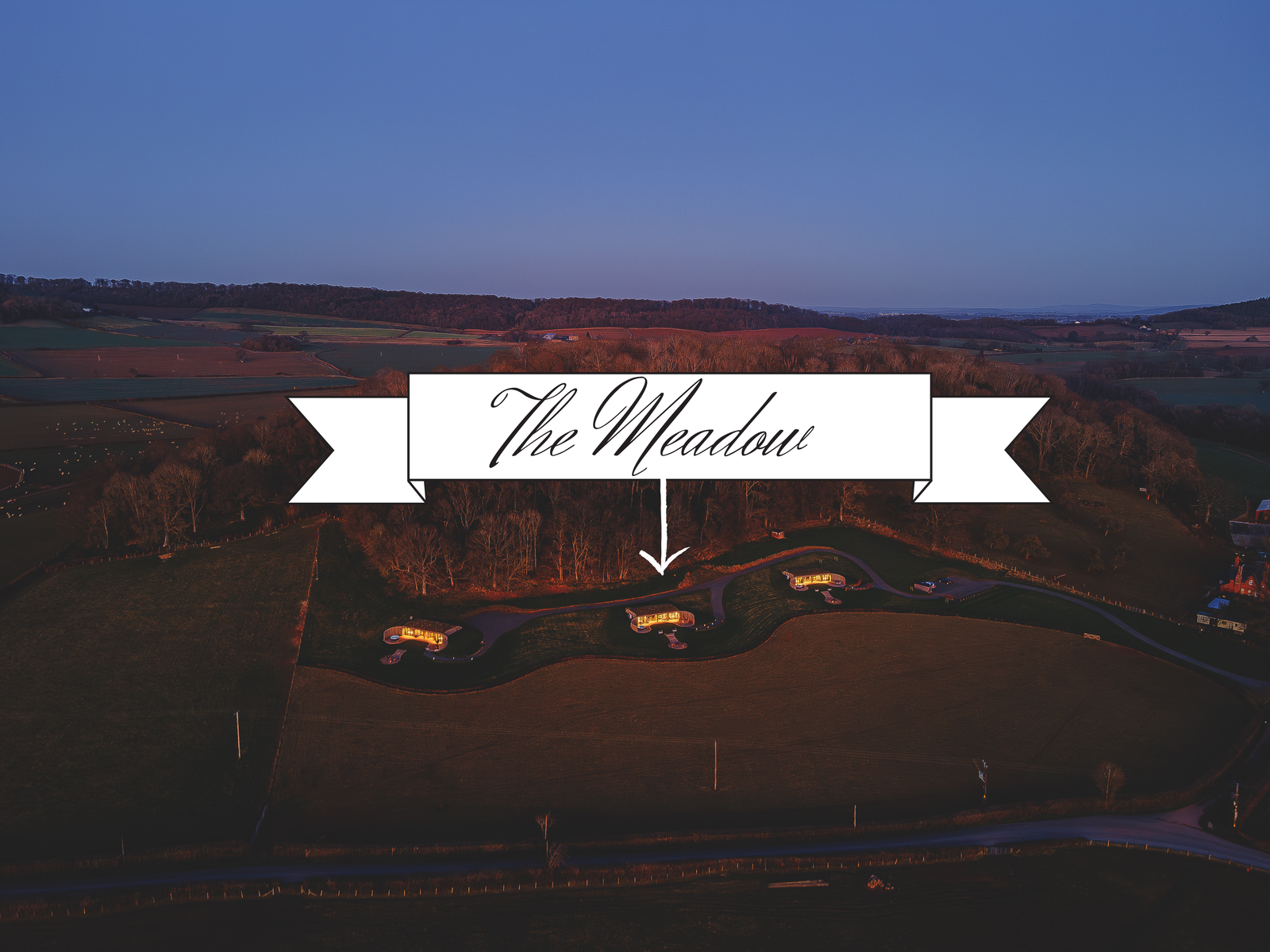 The Meadow lodge sign and position marker